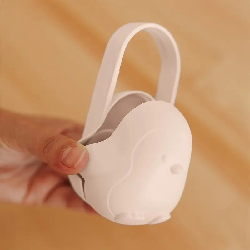 Porta-chupetas Miniland com pega de rebuçado de pinguim