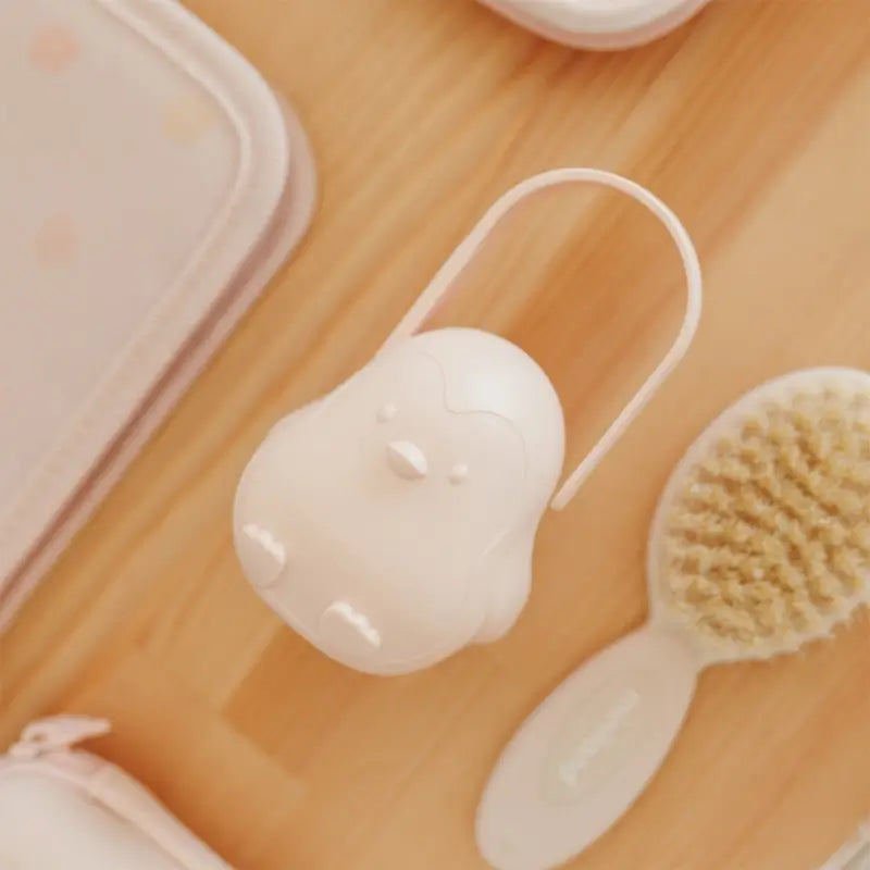 Porta-chupetas Miniland com pega de rebuçado de pinguim